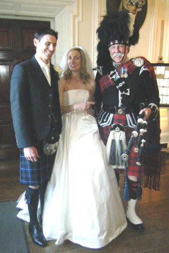 Photographs of Claire and Matt get married at Hopetoun House with James Nicholl piping.